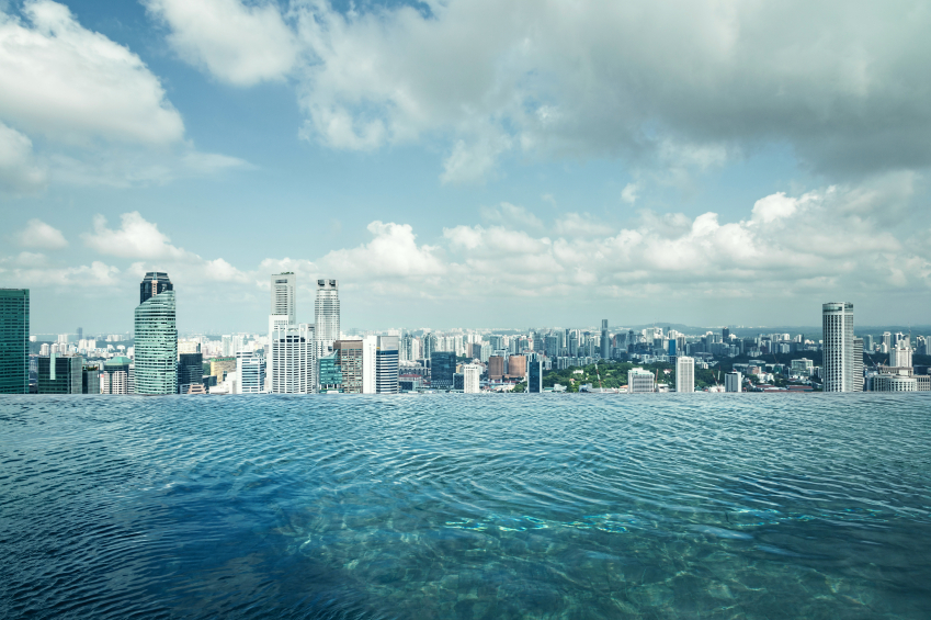Infinity swimming pool of the Marina Bay Sands in Singapore. international money transfers to Singapore